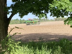 The fields with last year’s corn stubble are being disced, harrowed and rolled, likely to be planted with soybeans within days